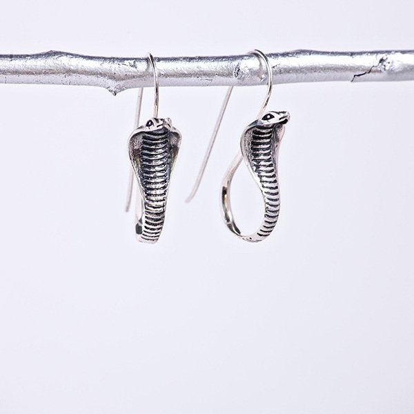 mystic cobra earrings. sterling silver dangling cobras.