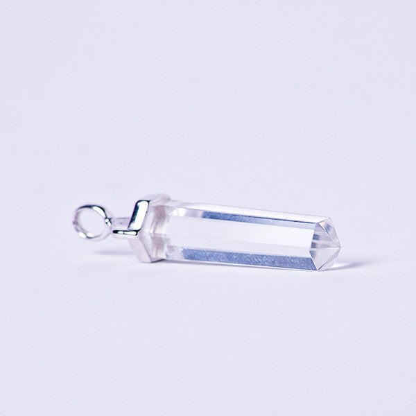 Medium clear quartz crystal pendant.