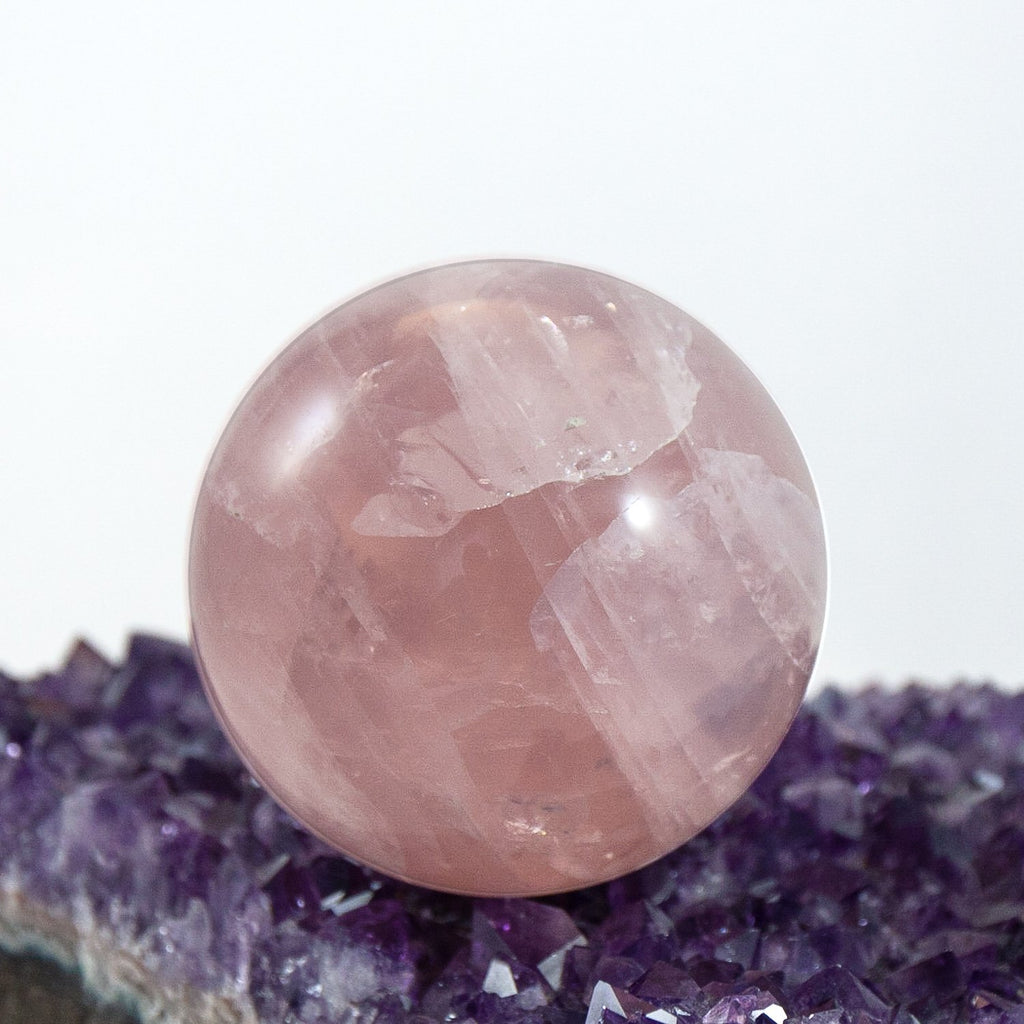 rose quartz circle of love crystal sphere.