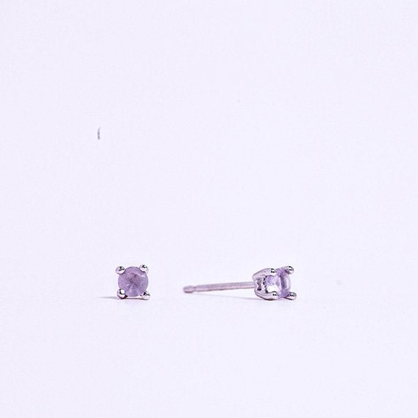 amethyst small faceted crystal earrings in a sterling silver post.