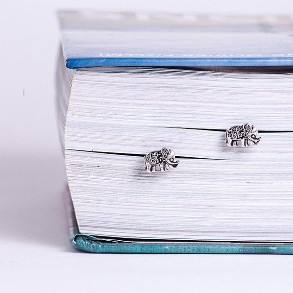sterling silver intricate elephant post earrings.