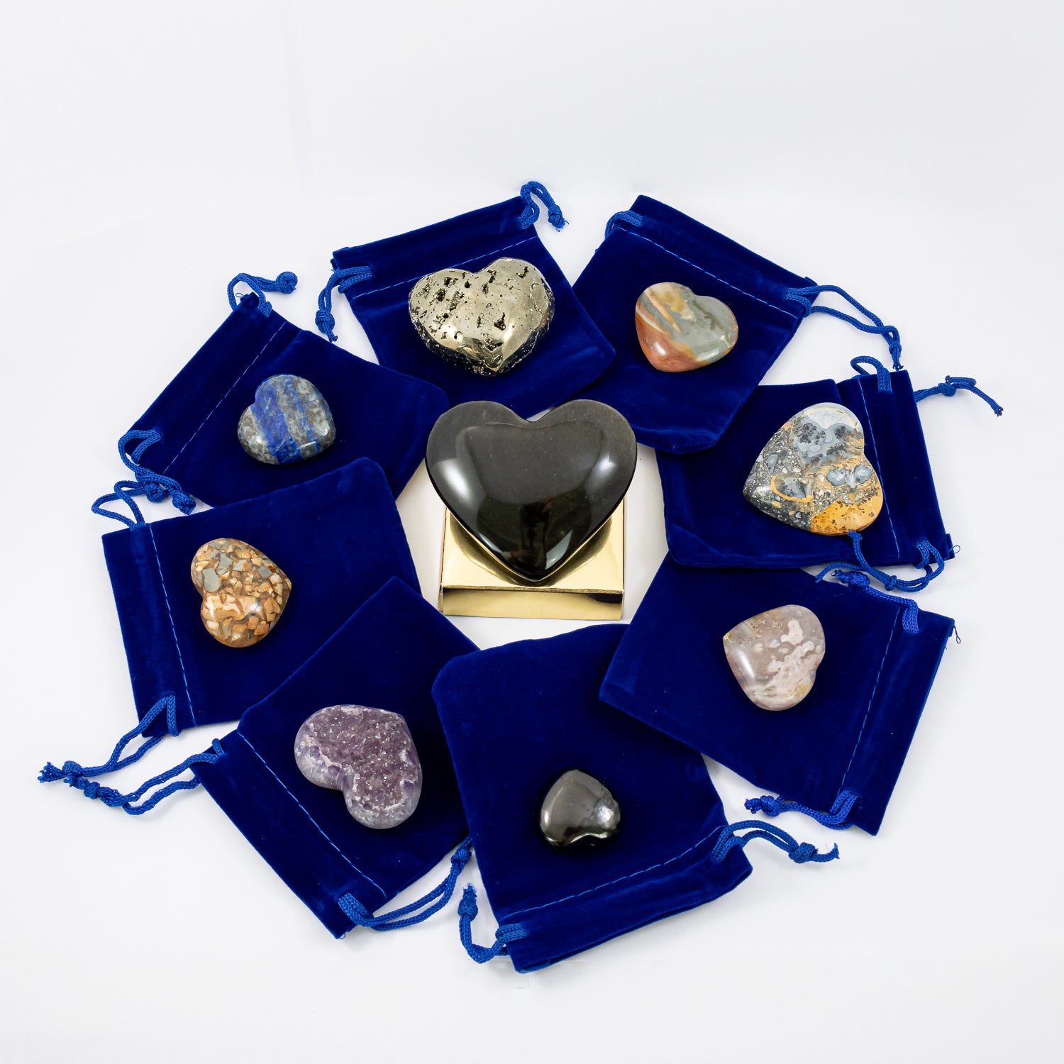 gifts from my heart crystal set (with blue velvet bags). amethyst crystal druzy heart, flower agate crystal heart, lapis lazuli crystal heart, polychrome jasper crystal heart, pyrite crystal heart , sheen obsidian crystal heart, shungite crystal heart, maligano jasper crystal heart, ibis jasper crystal heart.