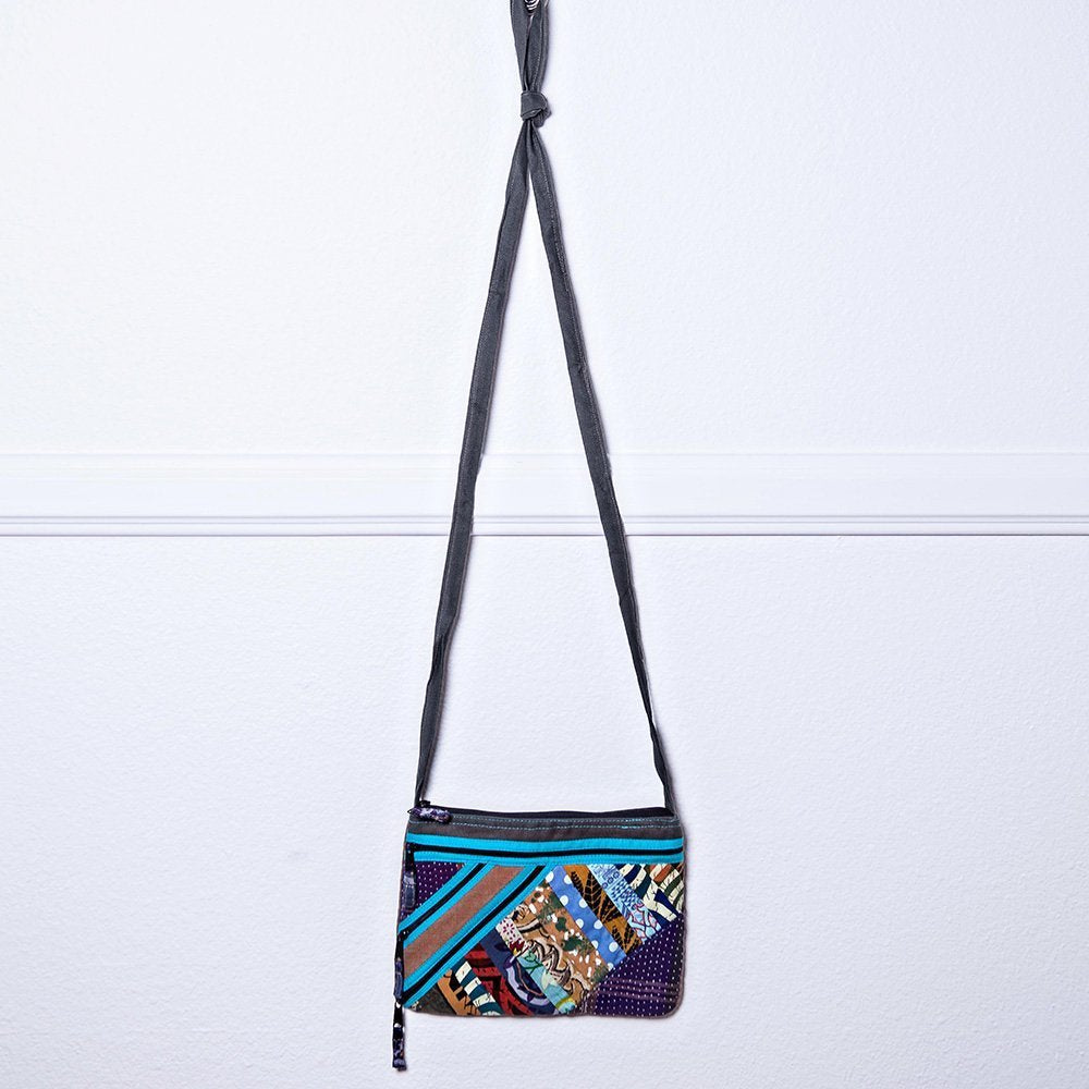 Diagonal zipper purse.