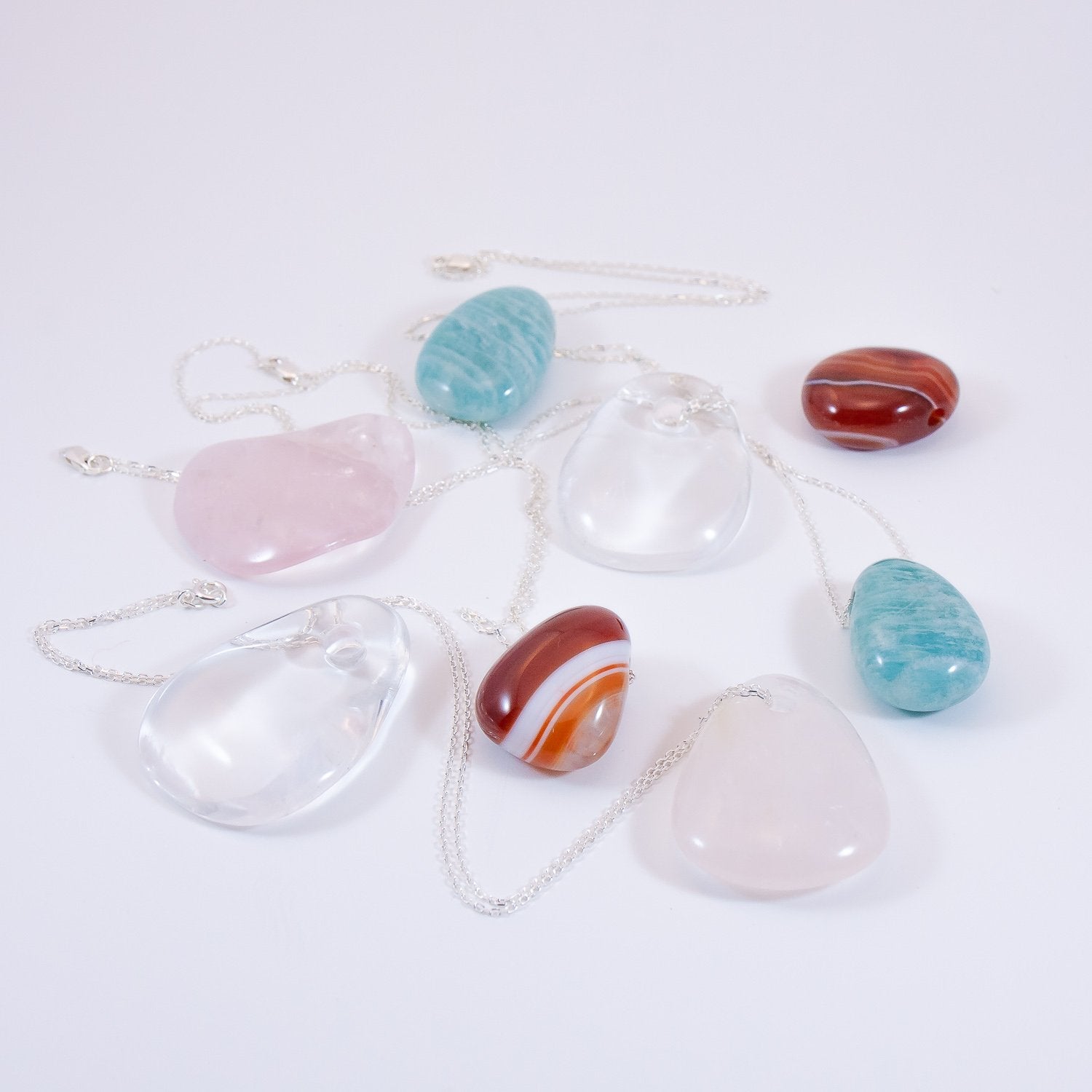 Crystal drop pendant necklaces. Amazonite, carnelian, clear quartz, rose quartz.