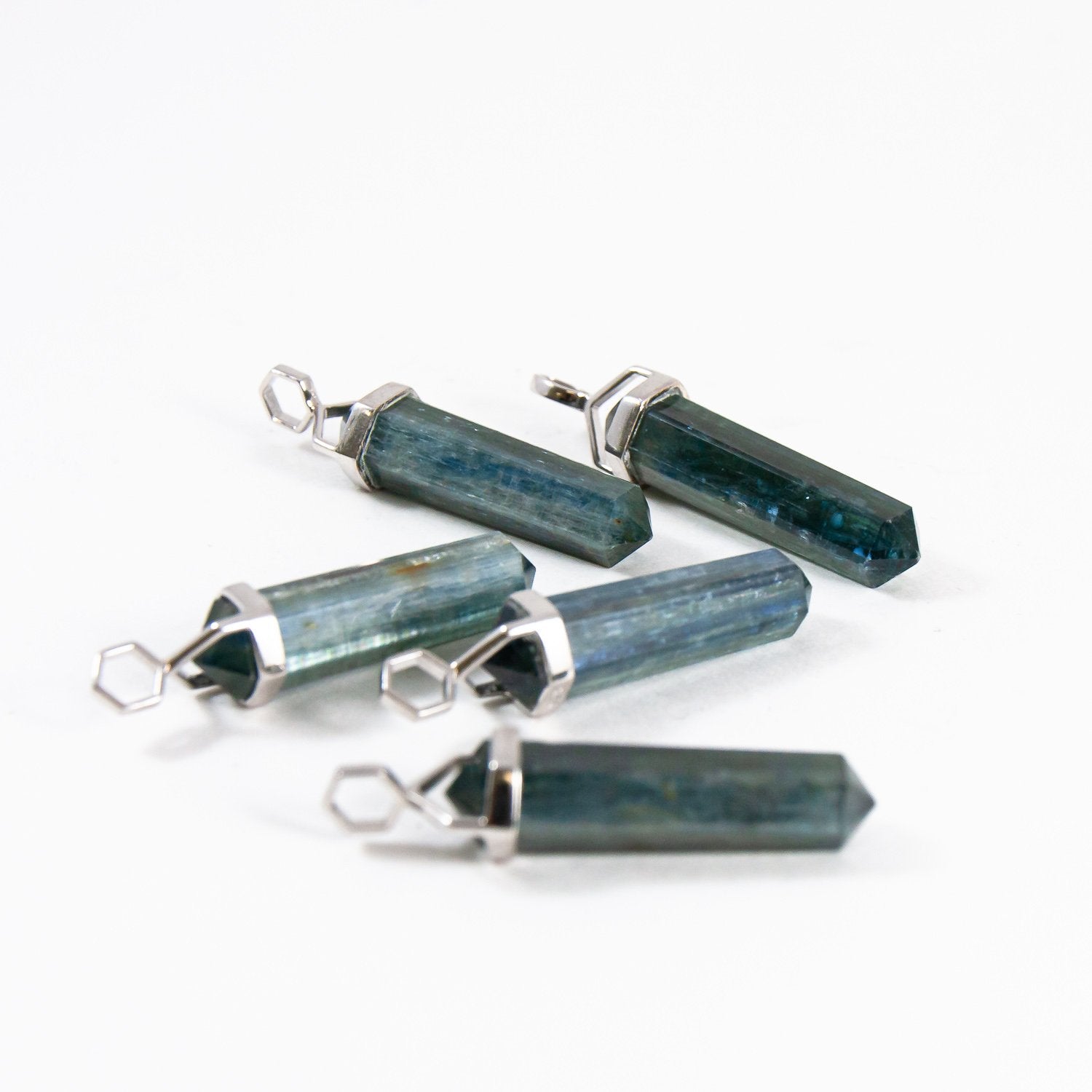 Kyanite crystal pendants.