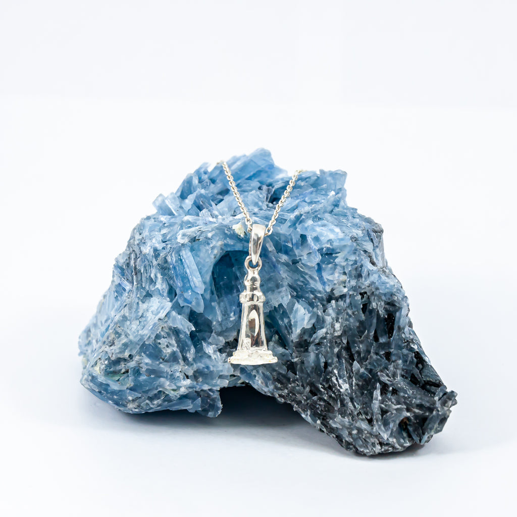 Sterling silver inner lighthouse charm necklace.