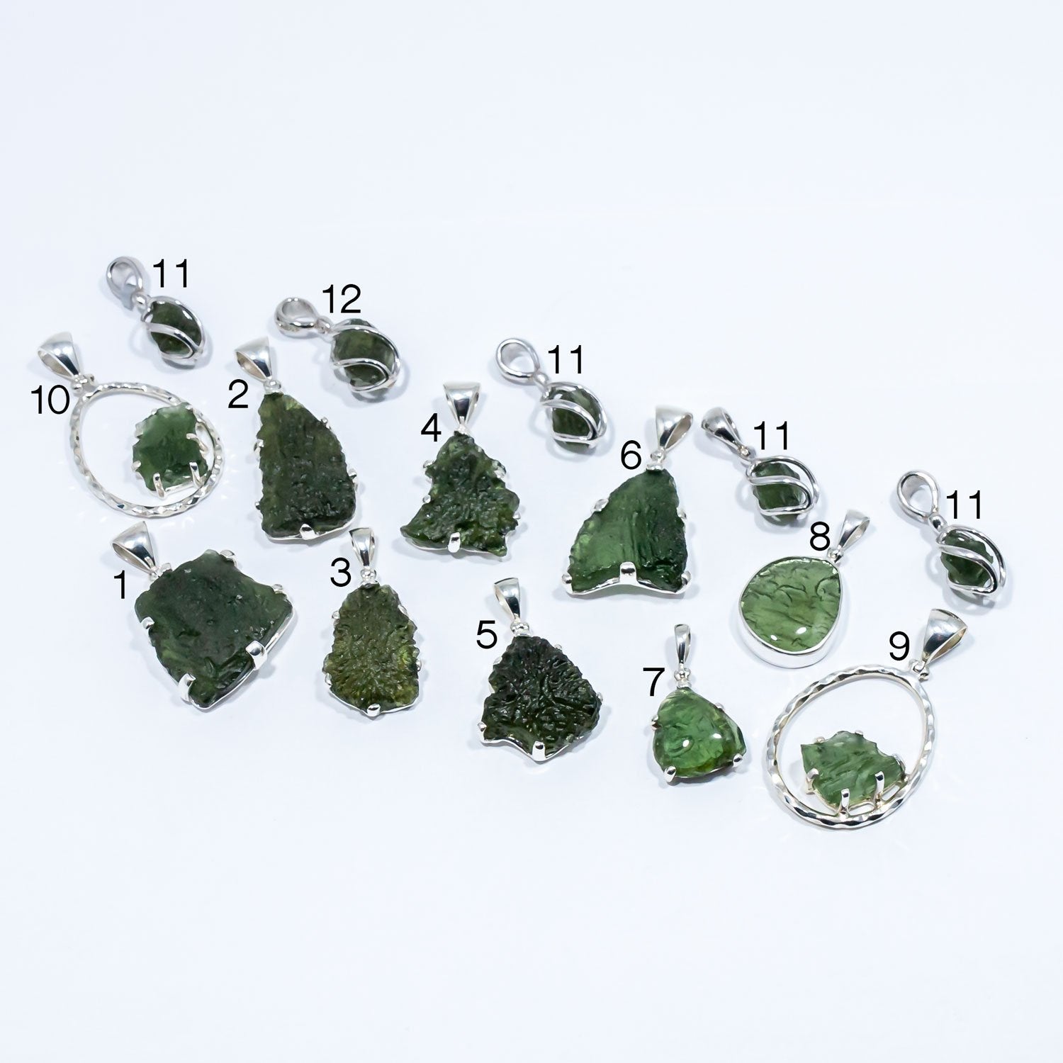 The moldavite pendants to choose from for the moldavite pendant necklace. Numbered 1-12