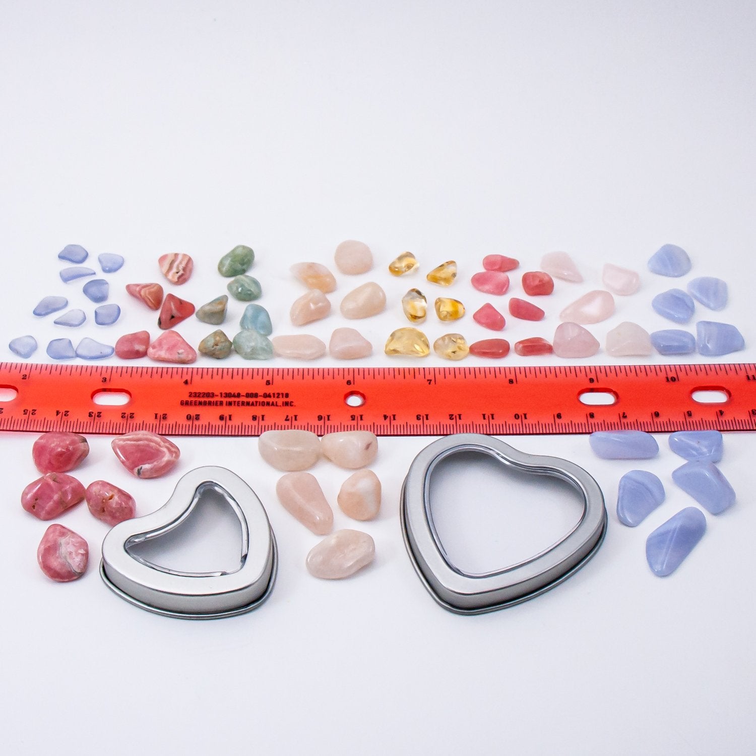 put a little love in your heart crystals. small and medium stone measurements reference with ruler.