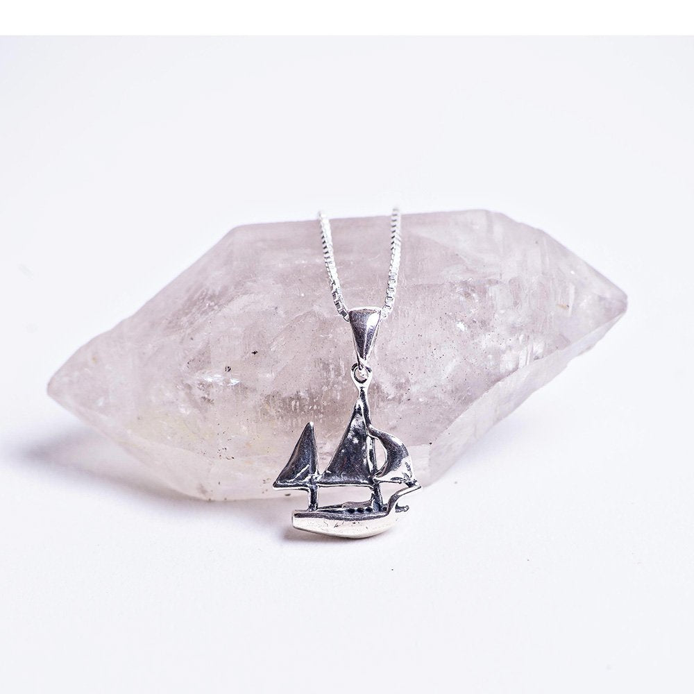 Sterling silver sailboat charm sail away with me necklace.