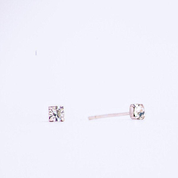cubic zirconia small crystal earrings in sterling silver posts.